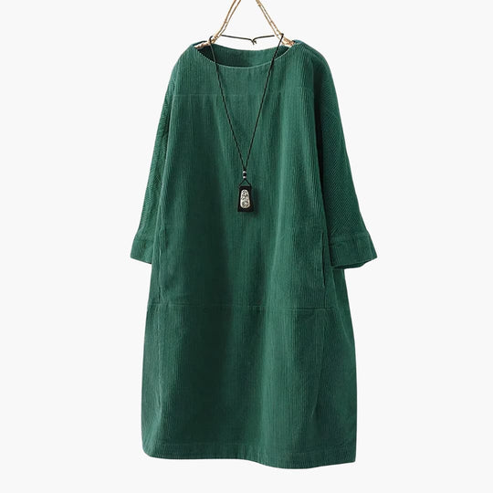 Women’s tunic dress with crew neckline and patch pockets