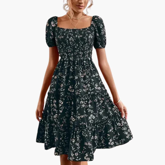 Women's short floral dress with puff sleeves and smocked bodice
