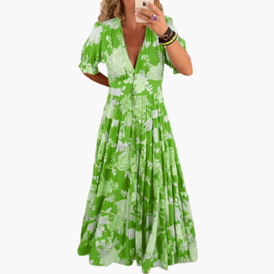 Women’s Maxi Dress with Deep V-Neckline and Pleated Skirt