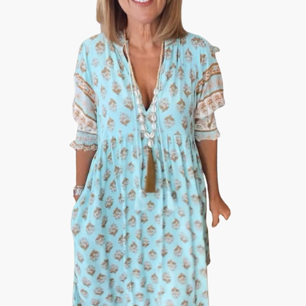 Women’s summer dress with V-neckline and half sleeves