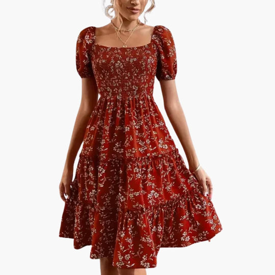 Women's short floral dress with puff sleeves and smocked bodice