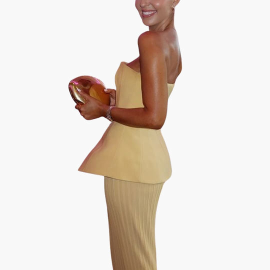 Women’s strapless maxi dress with peplum bodice and pleated skirt