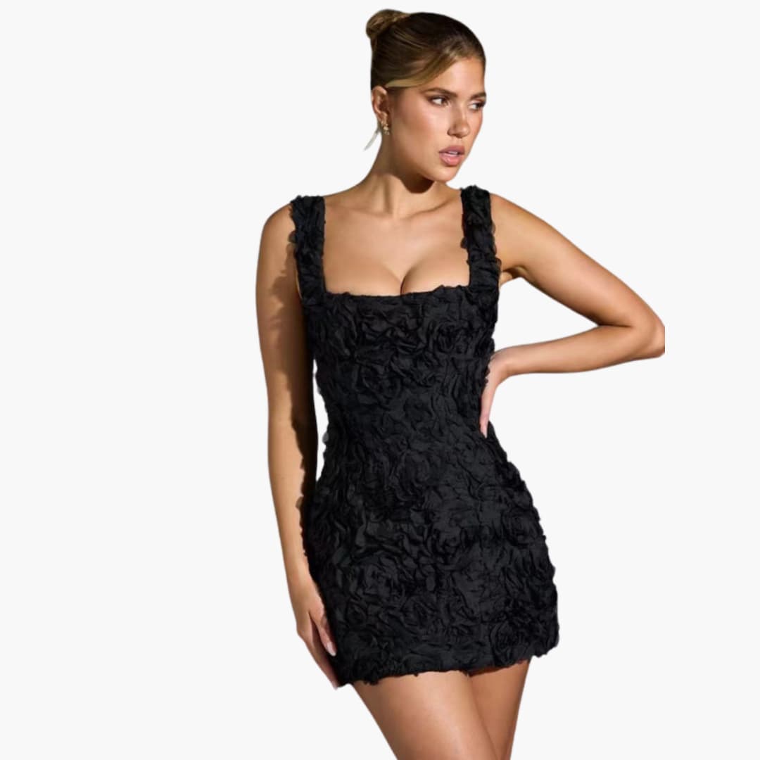 Women’s mini dress with sleeveless design and floral appliqué