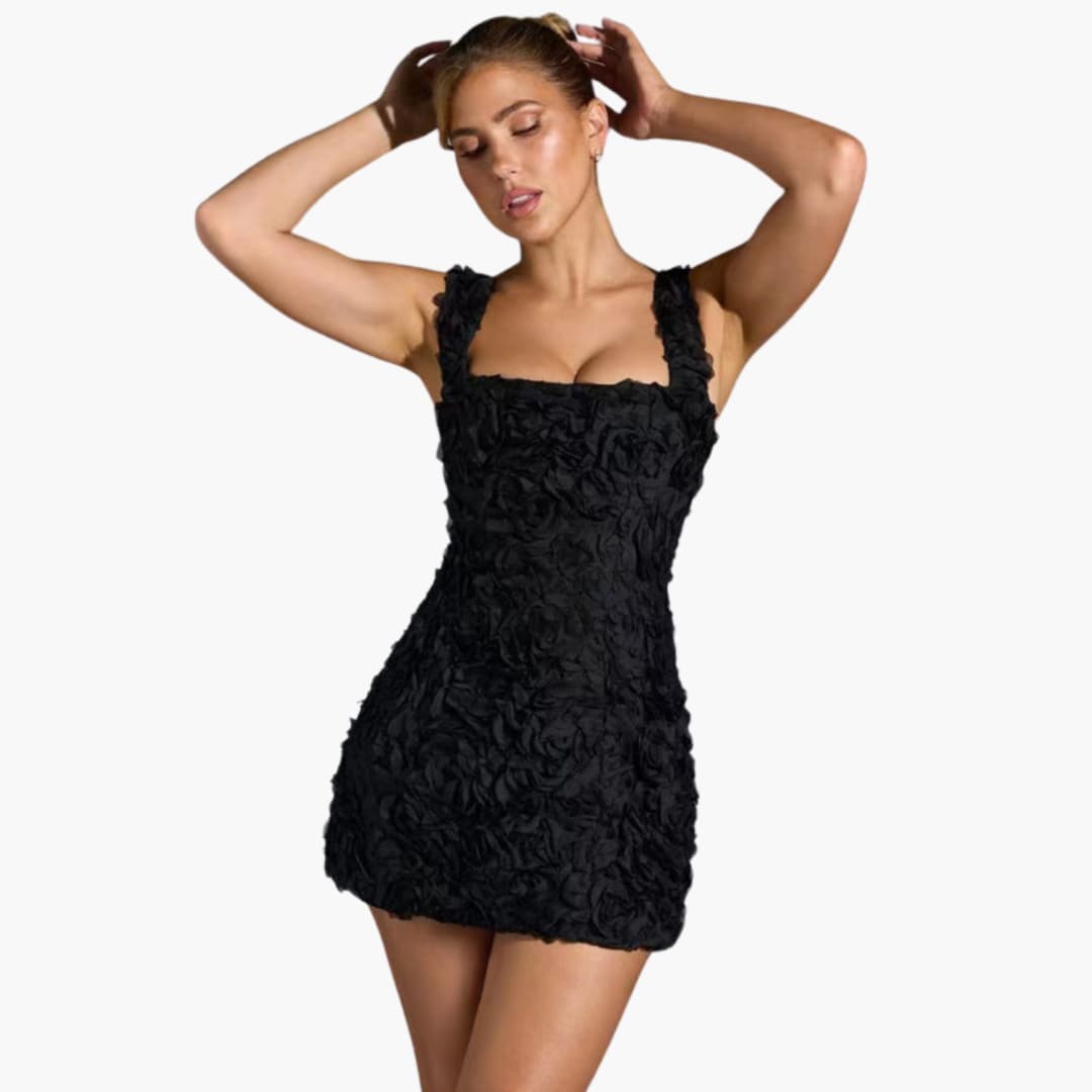 Women’s mini dress with sleeveless design and floral appliqué